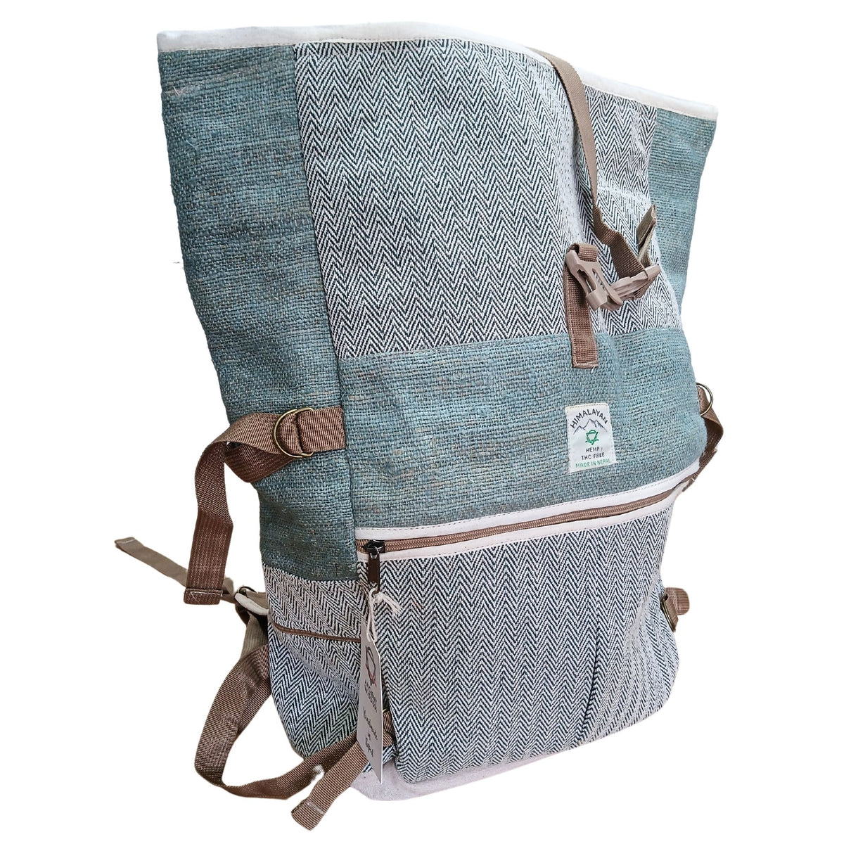 Side view of sage green hemp roll top backpack