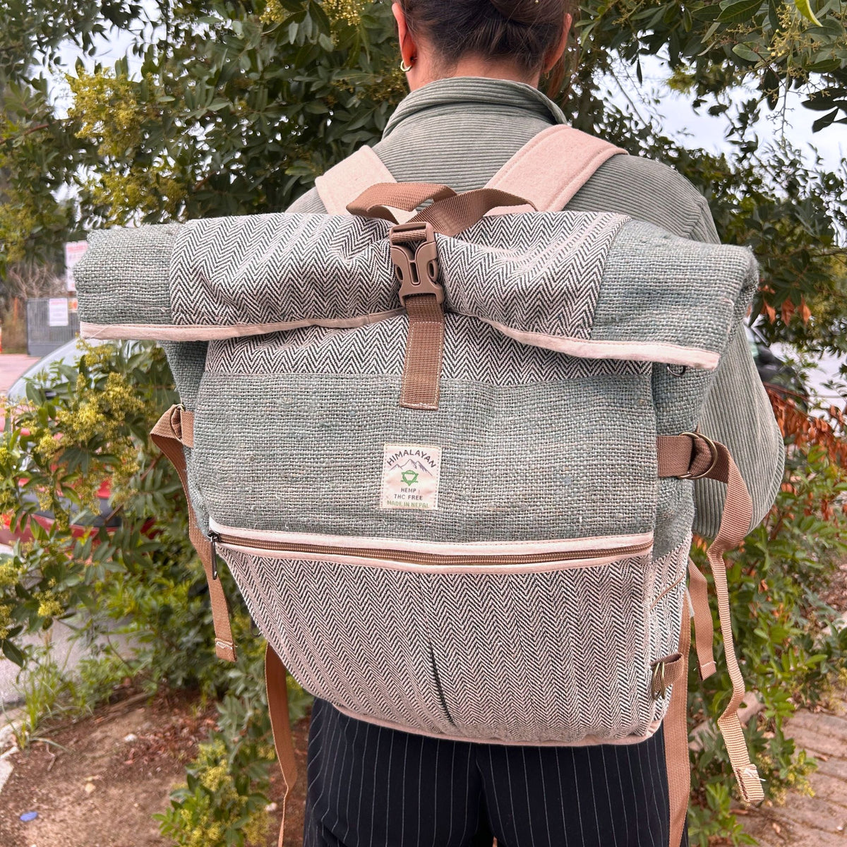 Hemp roll top backpack worn on the back