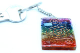 Colorful keychain with a spiral design on a white background