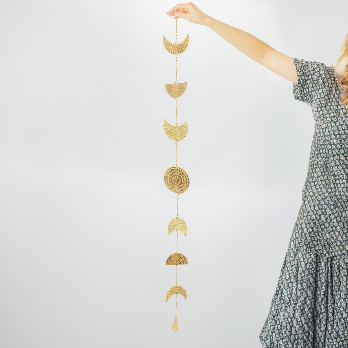One metre moon phases hanging decoration showing scale