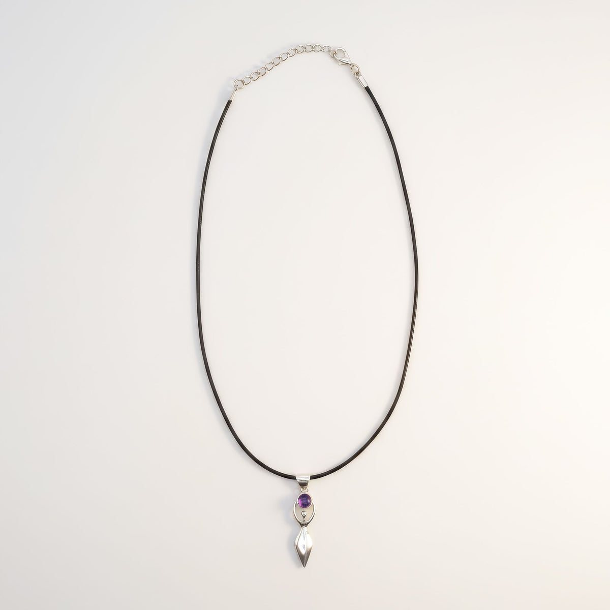 Silver-plated goddess pendant necklace with purple stone