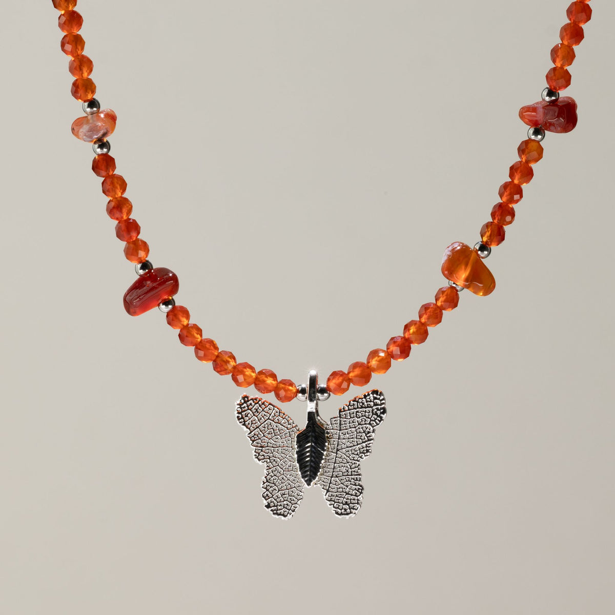 Nymph Ruby gemstone necklace with silver-plated real leaf butterfly pendant