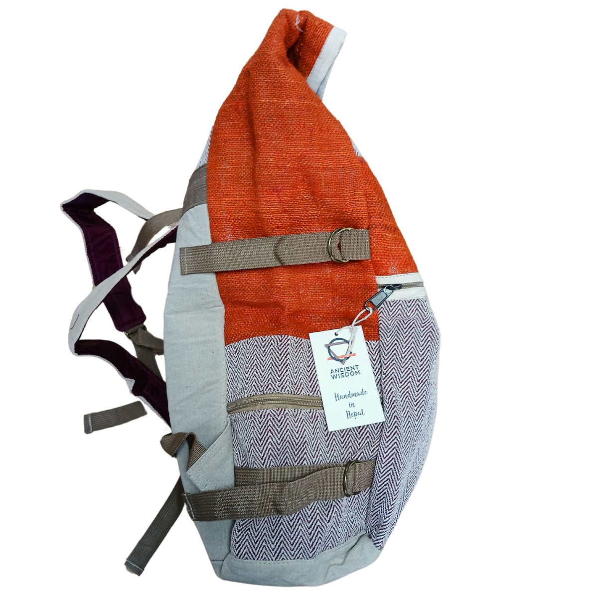 Side view of sunset orange hemp roll top backpack