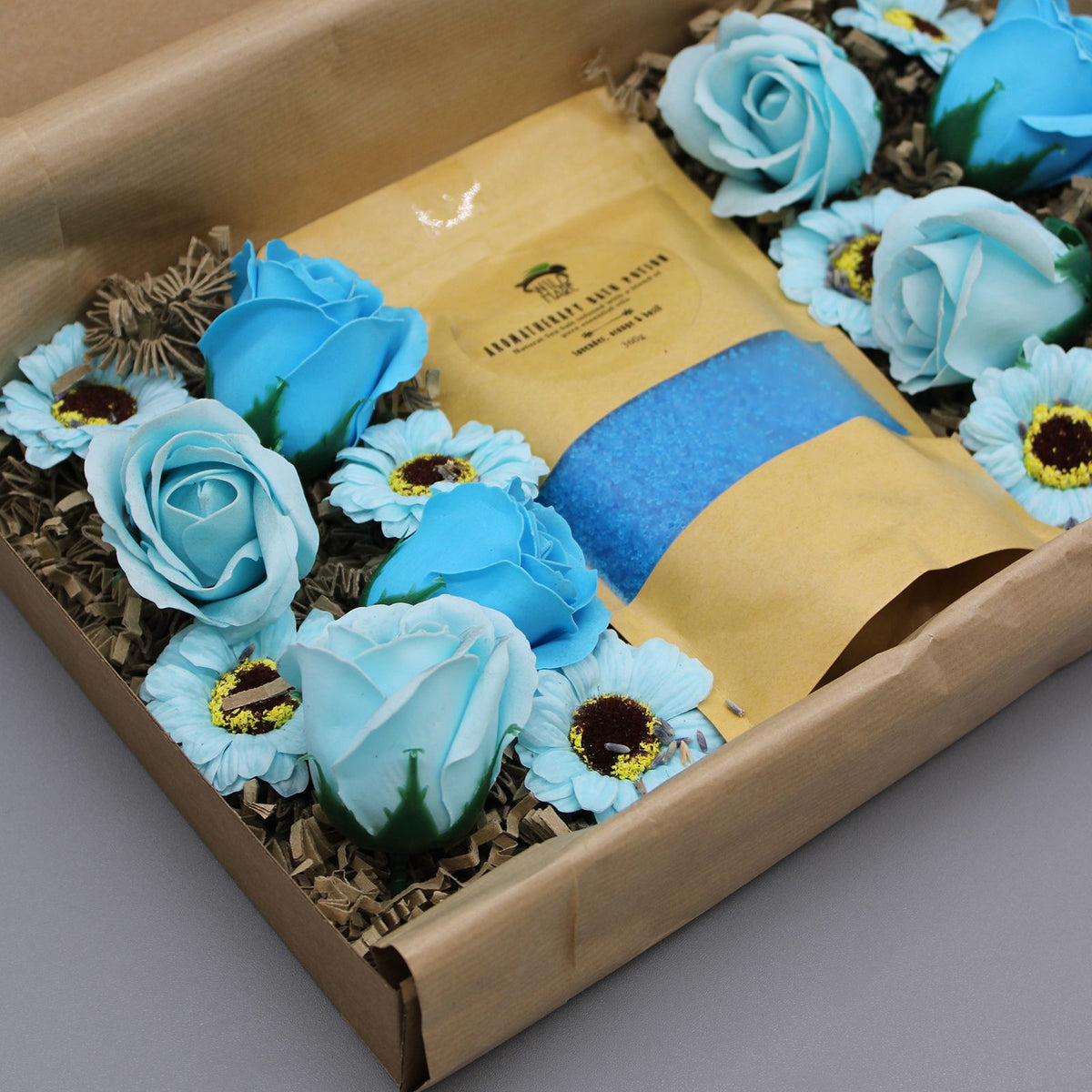 Total Unwind bath salts with blue soap flowers