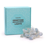 Celestite gemstone enchantment lights with packaging on a white background