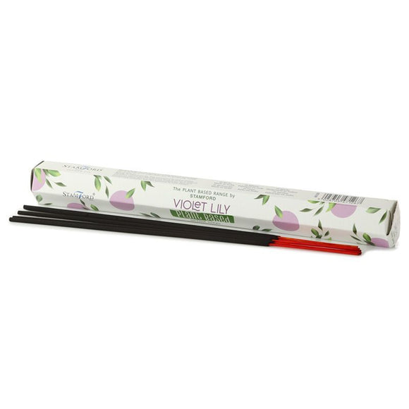 Incense sticks with packaging labeled 'Violet Lily' on a white background
