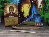Aromatika Buddha Flora incense packaging with incense sticks on a textured surface.