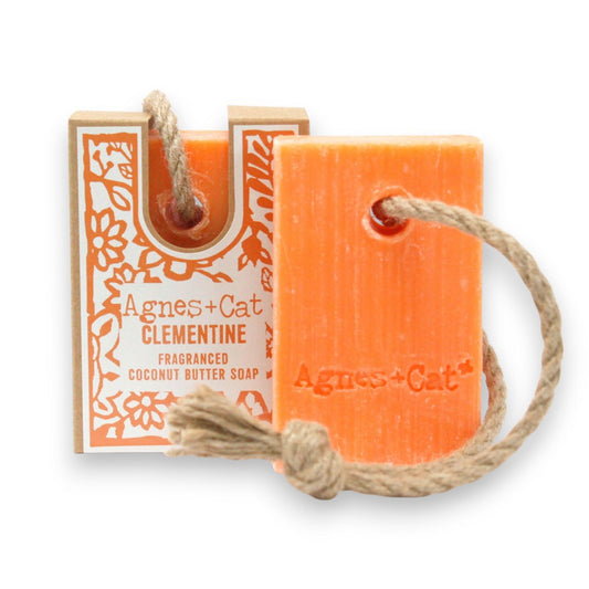 Orange Clementine soap bar with 'Agnes + Cat' branding on a white background