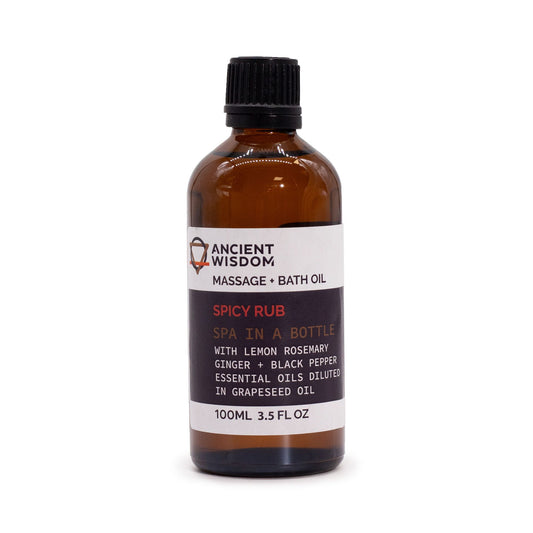 Bottle of Ancient Wisdom Spicy Rub massage and bath oil on a white background