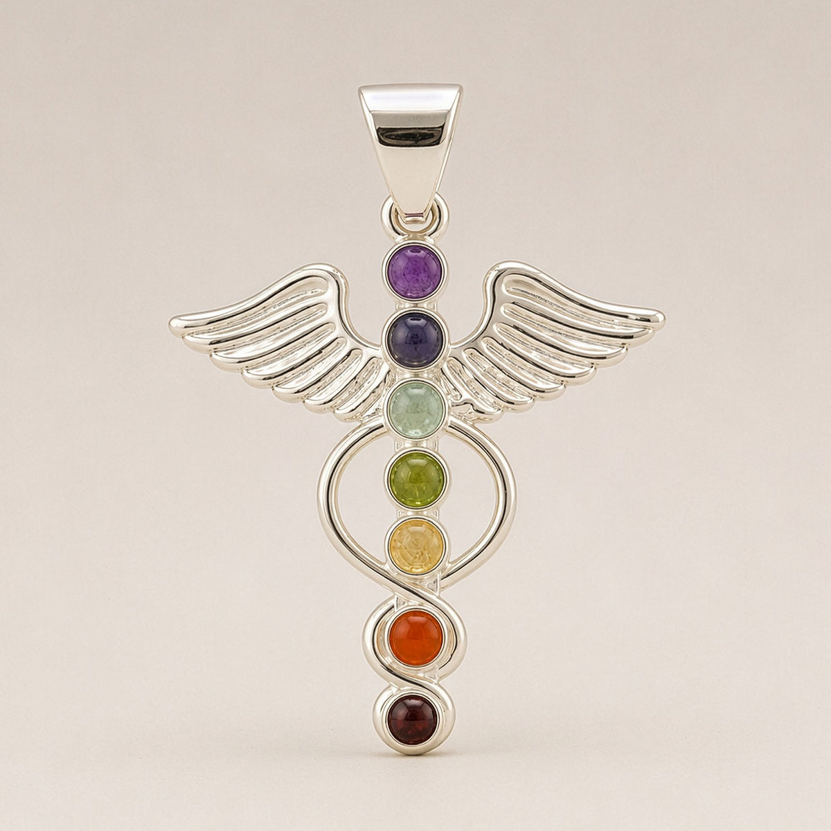 Silver-plated angel wing chakra pendant with coloured stones