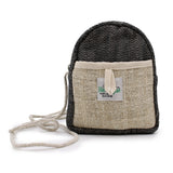 Small black and beige bag with a strap on a white background