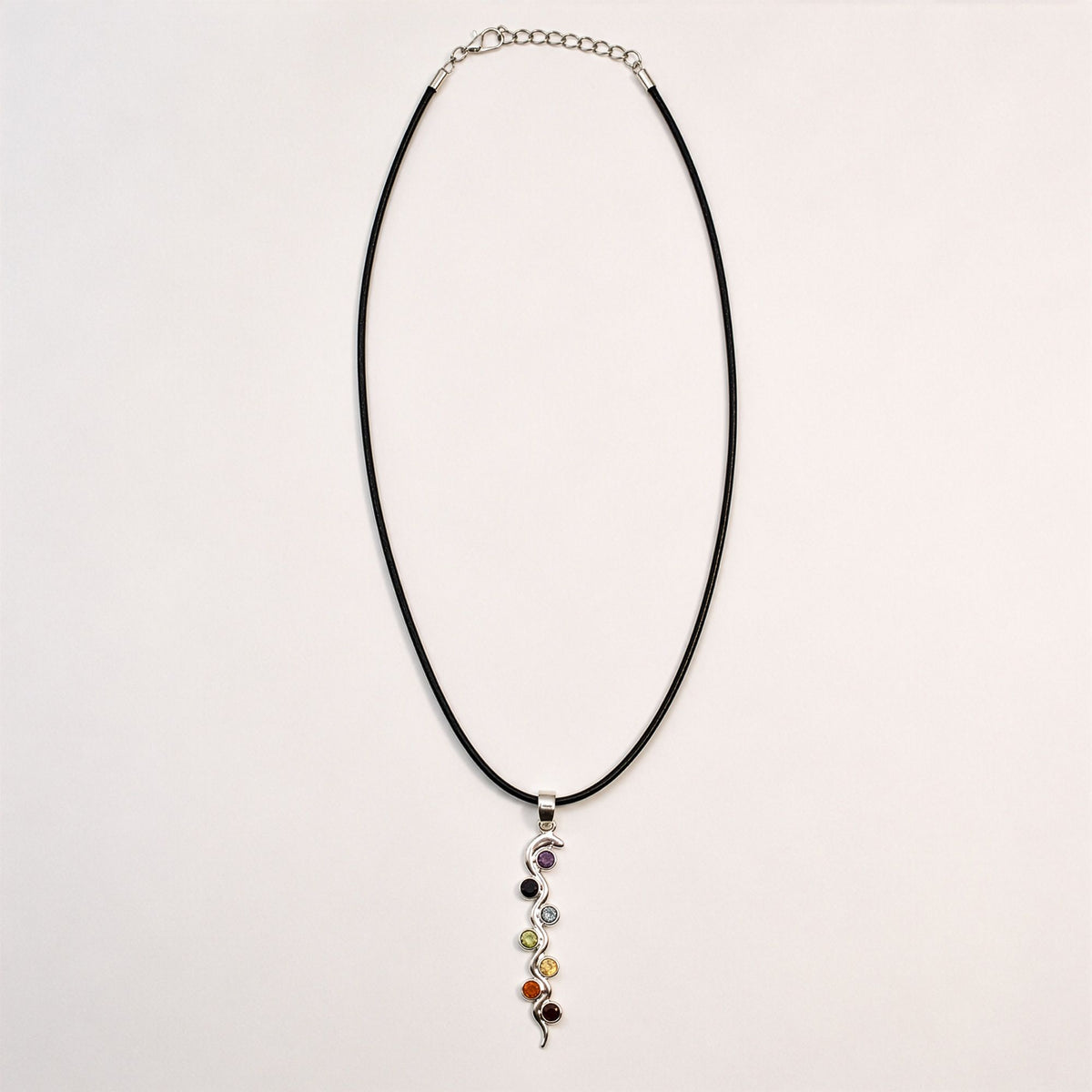 Silver-plated snake chakra pendant necklace on black cord
