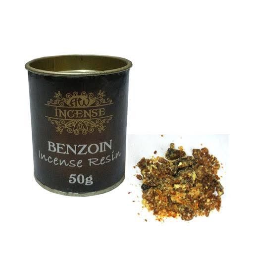 Black container of benzoin incense resin with gold text on a white background