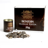 Incense resin with packaging and a small container on a white background