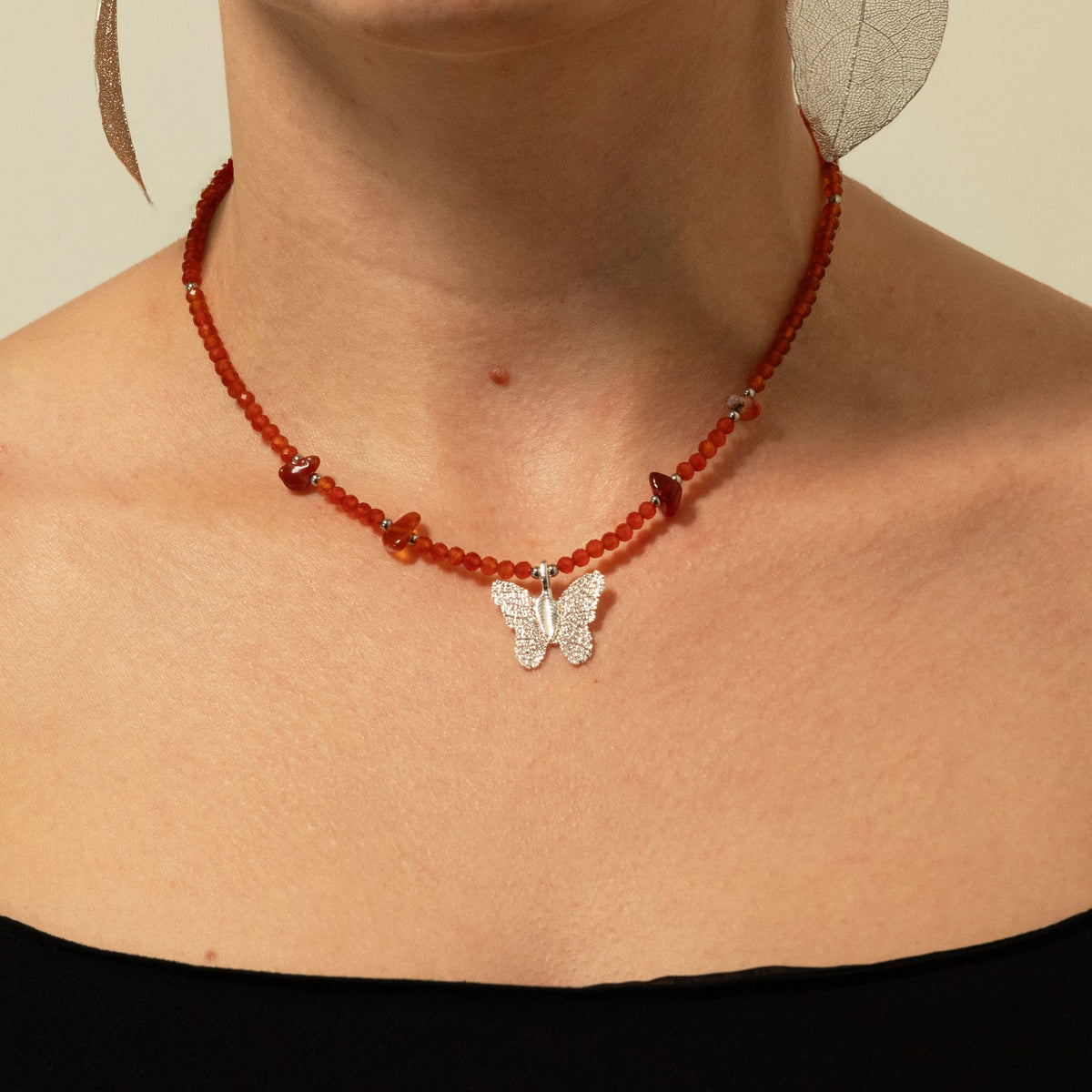 1. Nymph Ruby gemstone necklace worn around the neck