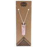 Necklace with a pink crystal pendant on a brown card with 'JF Jewellery' branding.