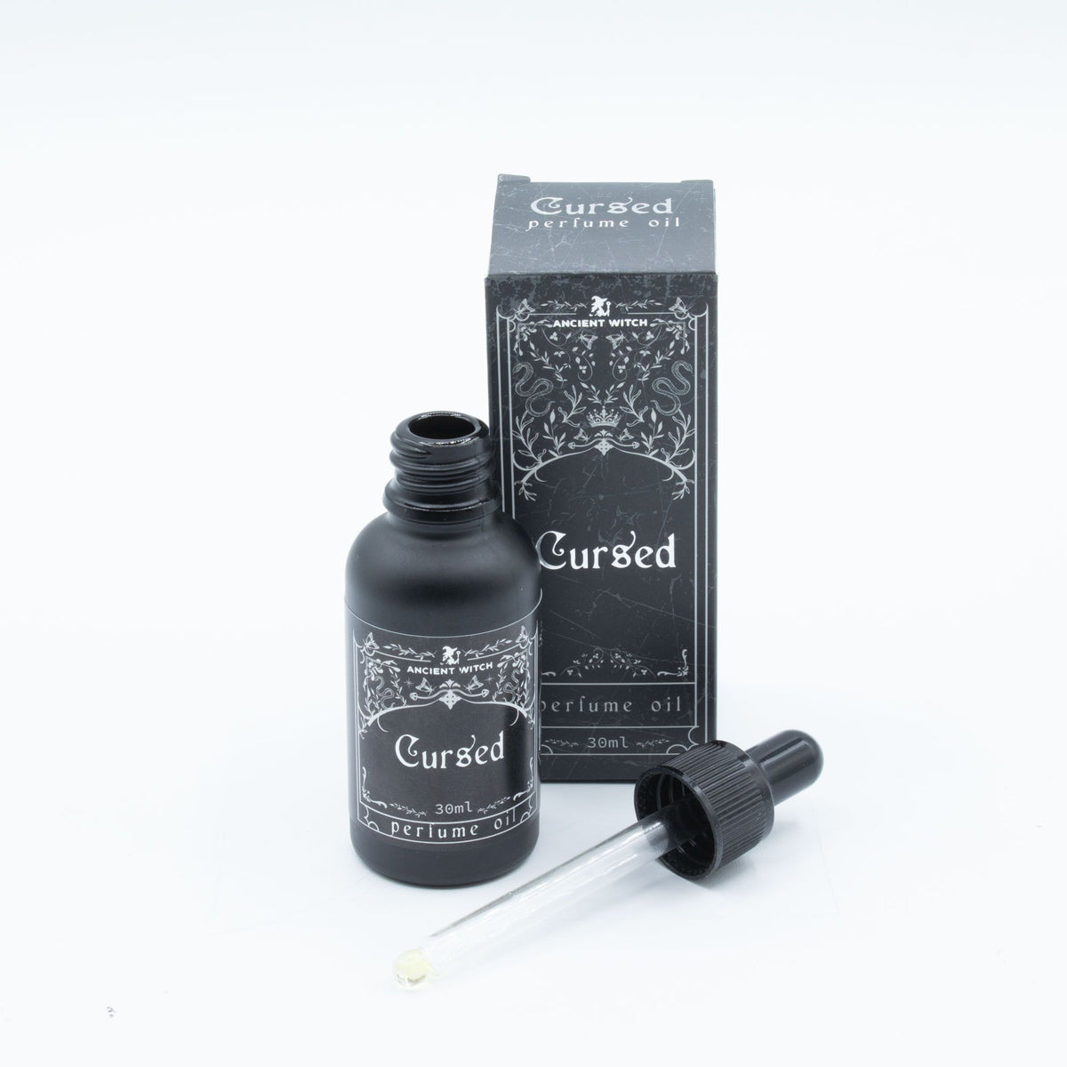 Ancient Witch Cursed perfume oil bottle and box