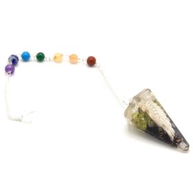 Crystal pendulum with chakra beads on a white background