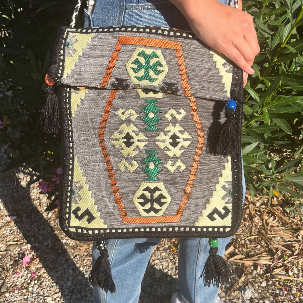 Grey Kilim festival shoulder bag worn crossbody