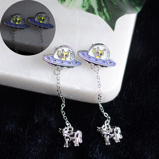 Glow in the dark alien abduction dangle earrings with UFO and cow