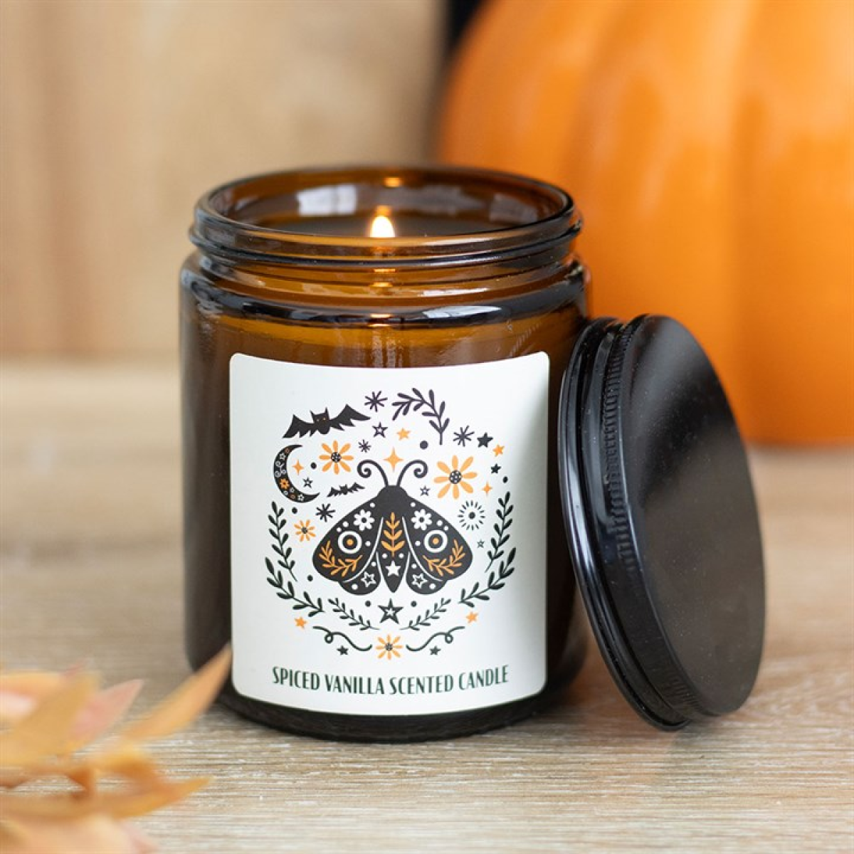 Frightful Folk moth spiced vanilla scented candle in brown apothecary jar