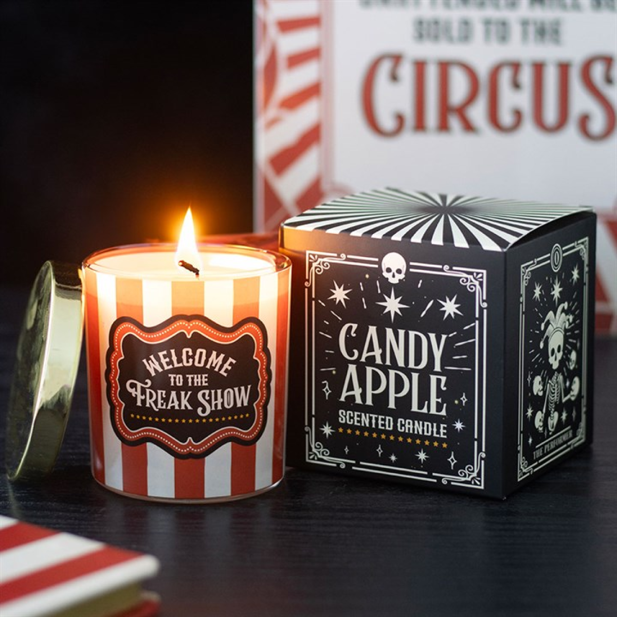 welcome to the freak show candle in candy apple scent