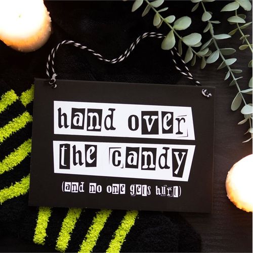 Hand Over the Candy sign in Halloween display