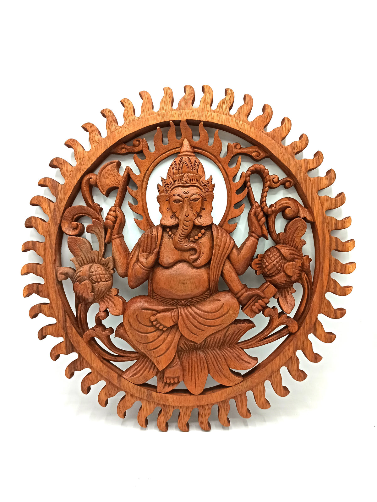 Hand carved Ganesh wall hanging made from sustainable Suar wood
