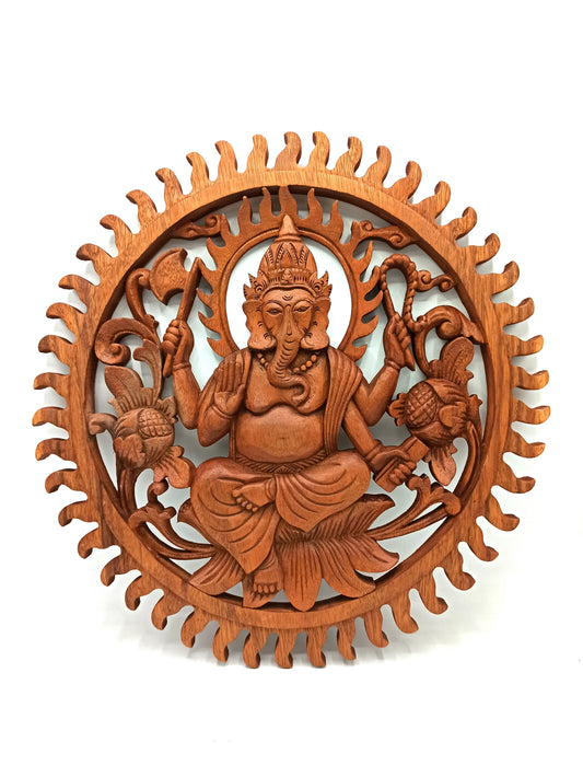 Hand carved Ganesh wall hanging made from sustainable Suar wood