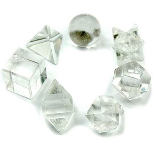 Seven piece clear quartz crystal set with geometric shapes
