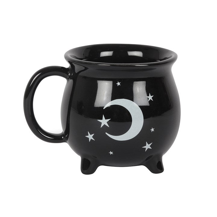 black cauldron shaped teacup with moon and stars deisgn