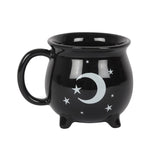 black cauldron shaped teacup with moon and stars deisgn