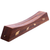 incense box with brass elephant decoration on sides. 
