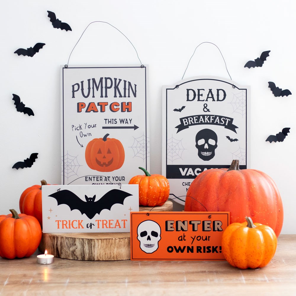 Halloween Pumpkin Patch sign with spooky seasonal decorations
