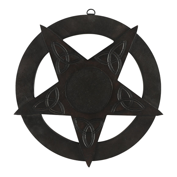 inverted black wooden pentagram with carved Celtic symbols